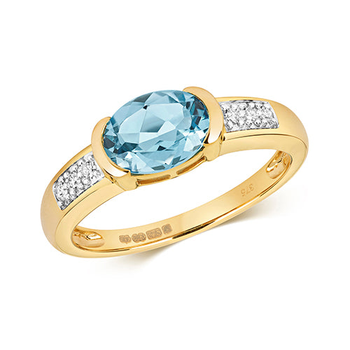 Blue Topaz And Diamond 9ct Yellow Gold Ring.