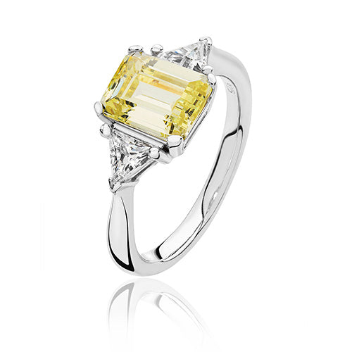 Sterling Silver AAA Cubic Zirconium and Simulated Yellow Diamond Three stone ring.